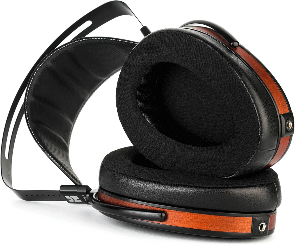 High-end over-ear headphones with black cushioned ear pads and a sleek wooden finish on the ear cups, featuring a black metal headband